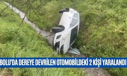 BOLU'DA DEREYE DEVRİLEN OTOMOBİLDEKİ 2 KİŞİ YARALANDI
