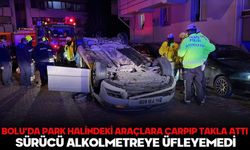 BOLU’DA PARK HALİNDEKİ ARAÇLARA ÇARPIP TAKLA ATTI: SÜRÜCÜ ALKOLMETREYE ÜFLEYEMEDİ