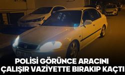 POLİSİ GÖRÜNCE ARACINI ÇALIŞIR VAZİYETTE BIRAKIP KAÇTI