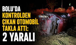 BOLU'DA KONTROLDEN ÇIKAN OTOMOBİL TAKLA ATTI: 2 YARALI