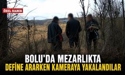 BOLU’DA MEZARLIKTA DEFİNE ARARKEN KAMERAYA YAKALANDILAR